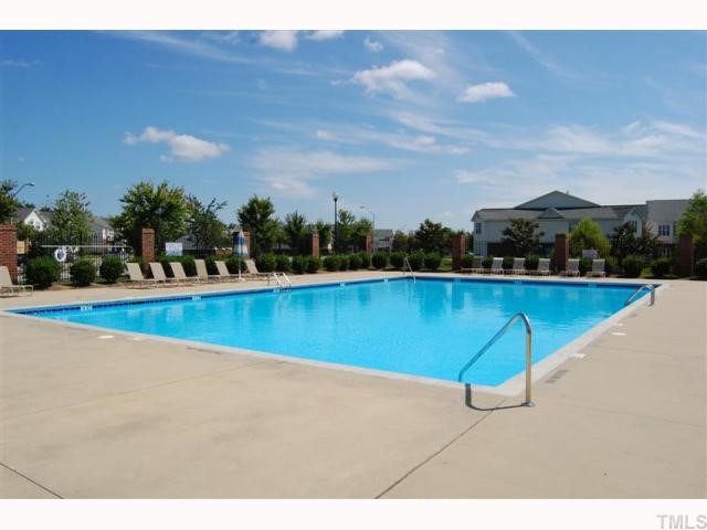 2031 Rivergate Road, Unit 107 Raleigh, NC 27614 - Photo 4 of 12 a view of a swimming pool and a yard