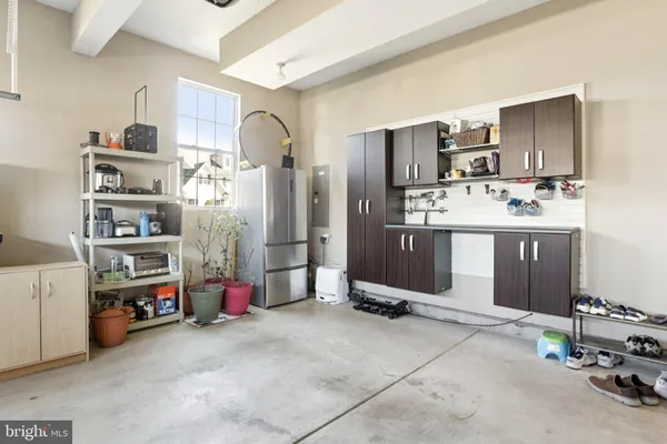 a view of a house with patio and a yard