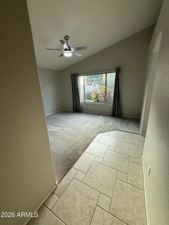 a bathroom with a double vanity sink mirror and shower
