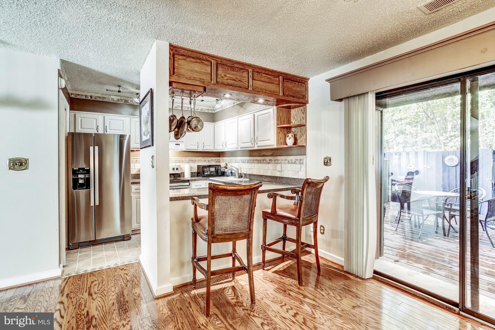 2254 Coppersmith Square Reston, VA 20191 - Photo 3 of 25 Dining Room next to Kitchen