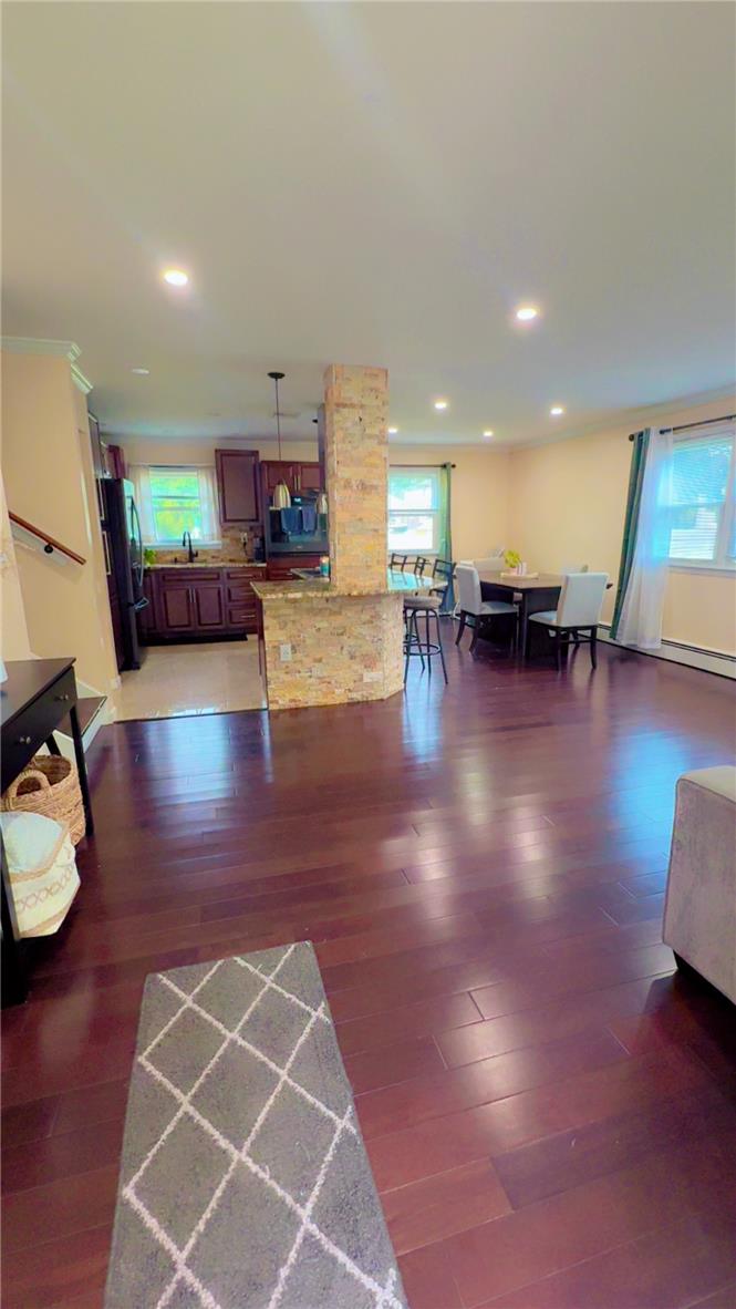 1844 29th Street Southwest Allentown, PA 18103 - Photo 2 of 37 Gleaming hardwood floors and recessed lighting enhance the airy, open-concept main level.