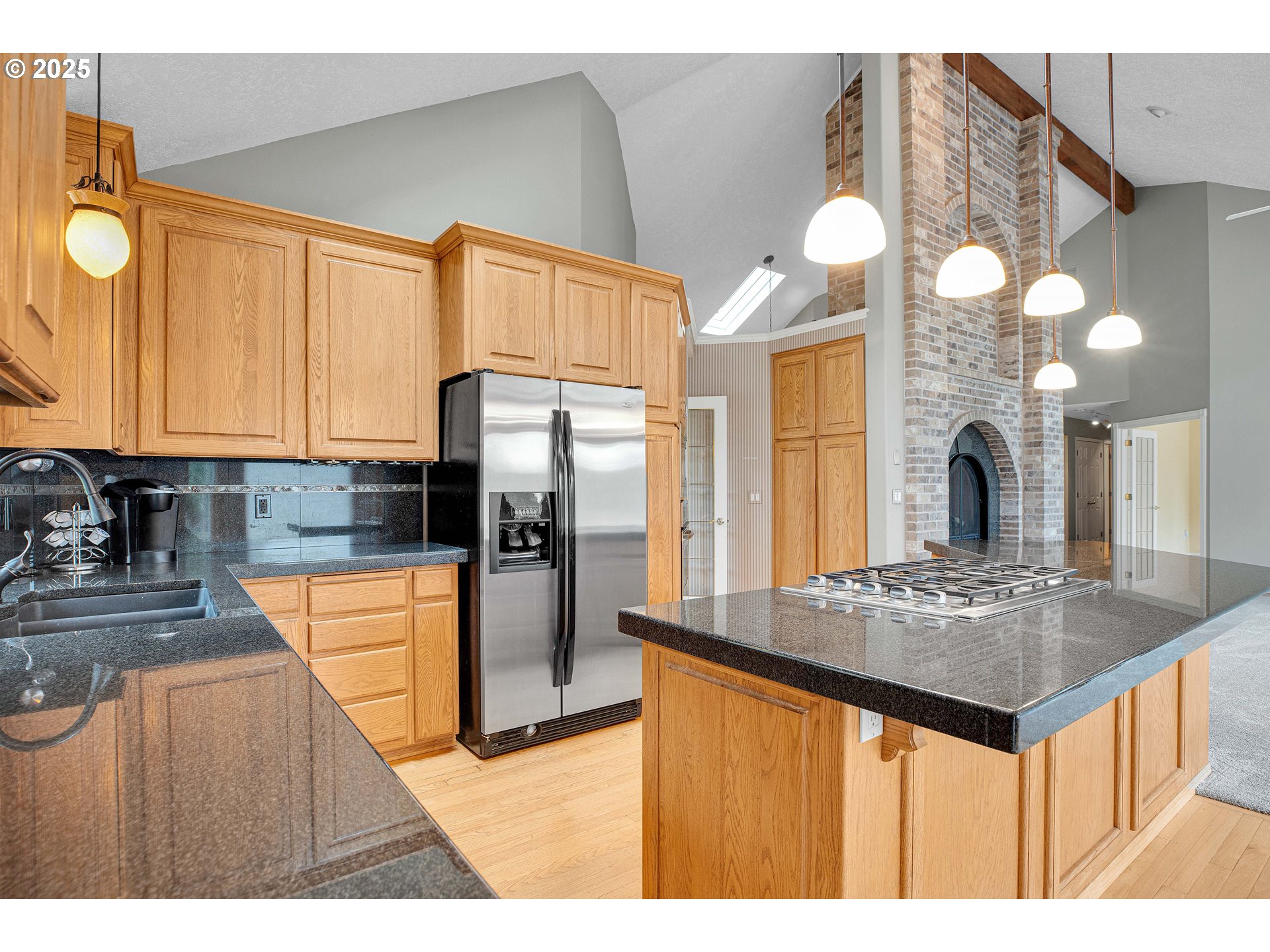 38651 Southeast Serban Road Sandy, OR 97055 - Photo 13 of 46 a kitchen with stainless steel appliances granite countertop a sink a oven and a refrigerator