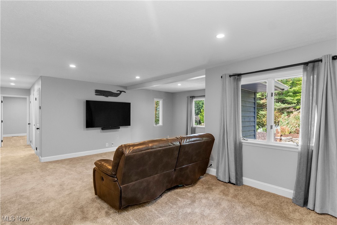 4694 Heather Hills Road Akron, OH 44333 - Photo 17 of 32 Living room with light colored carpet