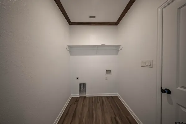 a view of small space with racks on the wall