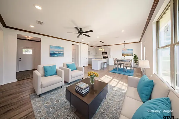 a view of kitchen with cabinets and wooden floor
