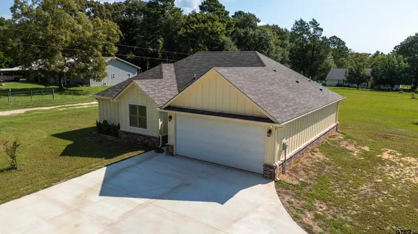 a view of a swimming pool with seating area