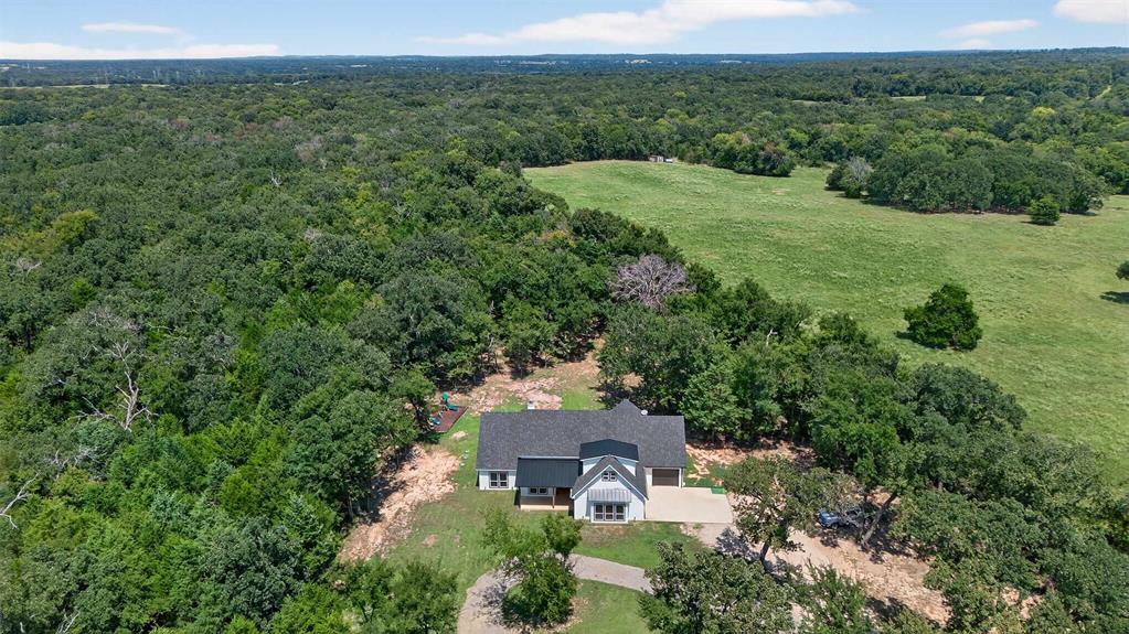 9697 County Road 1405 Athens, TX 75751 - Photo 33 of 38 an aerial view of a house with a yard