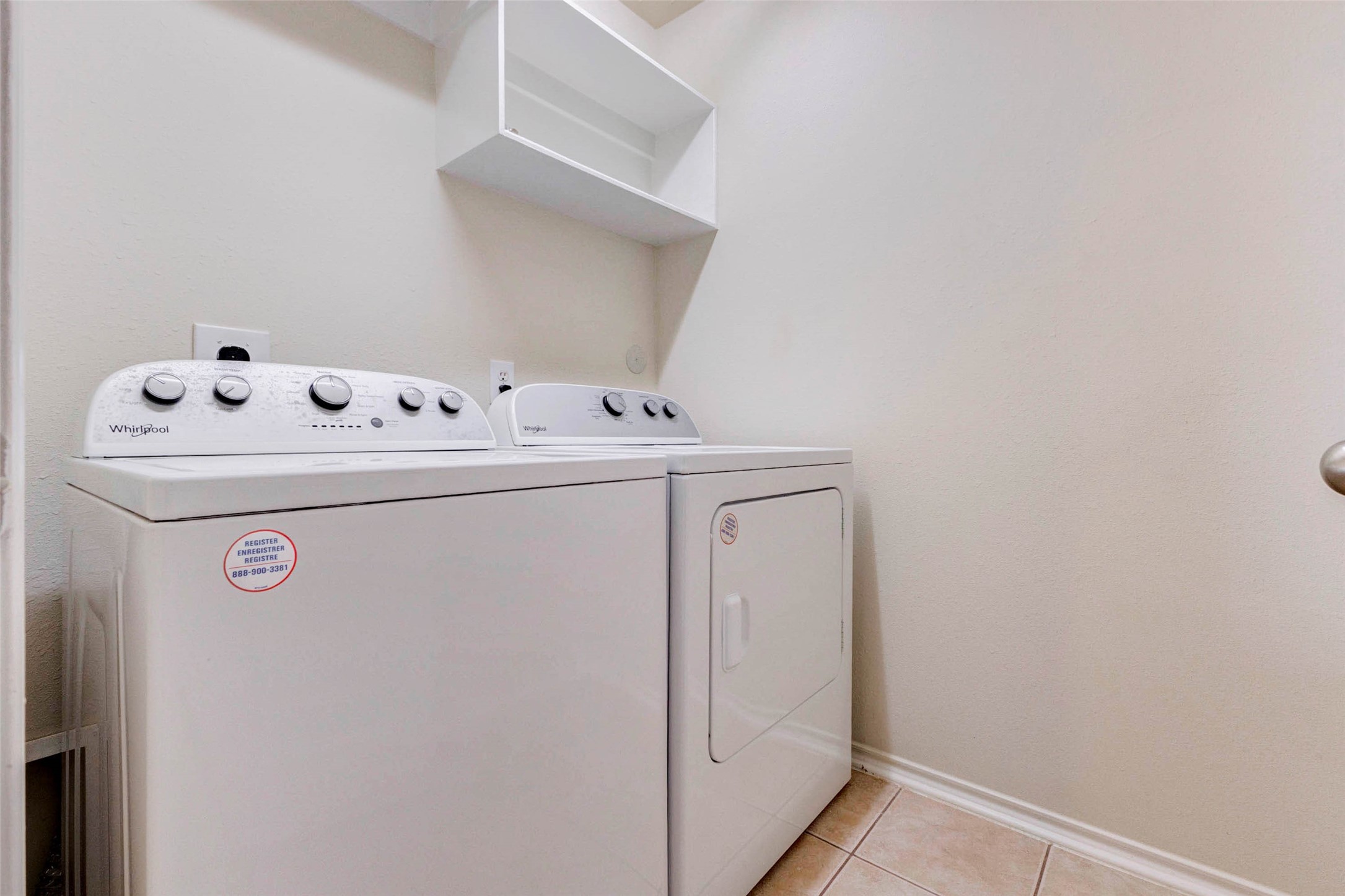 13106 Peppergate Lane Houston, TX 77044 - Photo 12 of 17 a utility room with dryer and washer