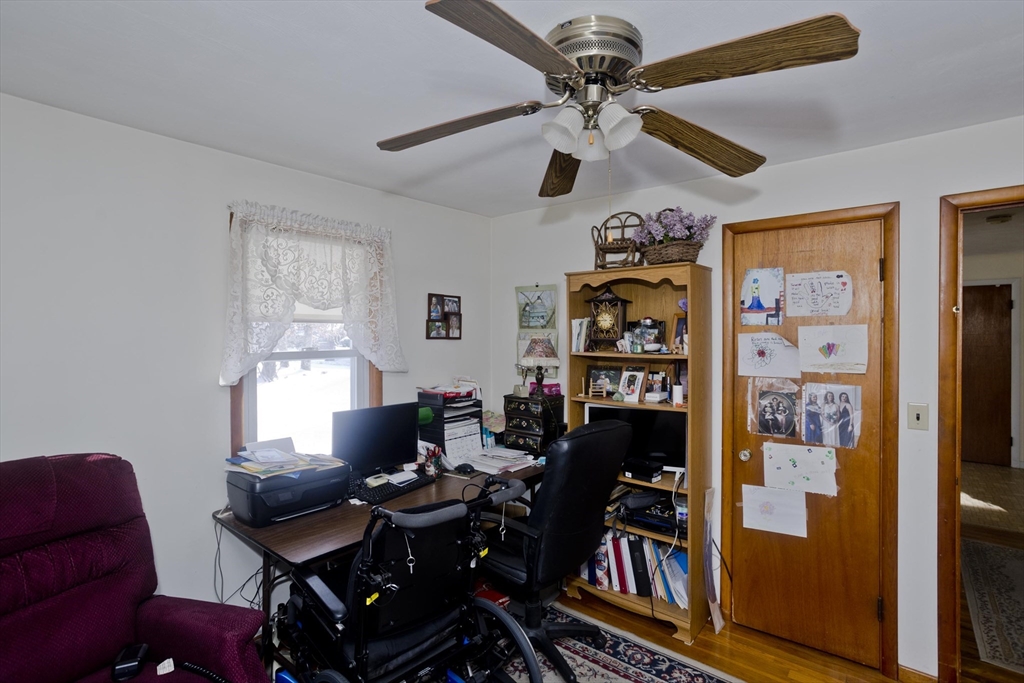 129 Cooper Street Springfield, MA 01108 - Photo 20 of 26 a view of a workspace with furniture and a window