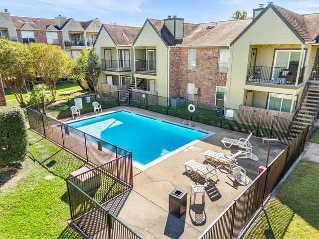 an aerial view of a city with an ocean view