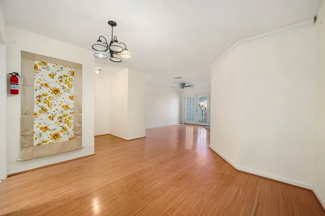 a kitchen with stainless steel appliances granite countertop a stove and a refrigerator