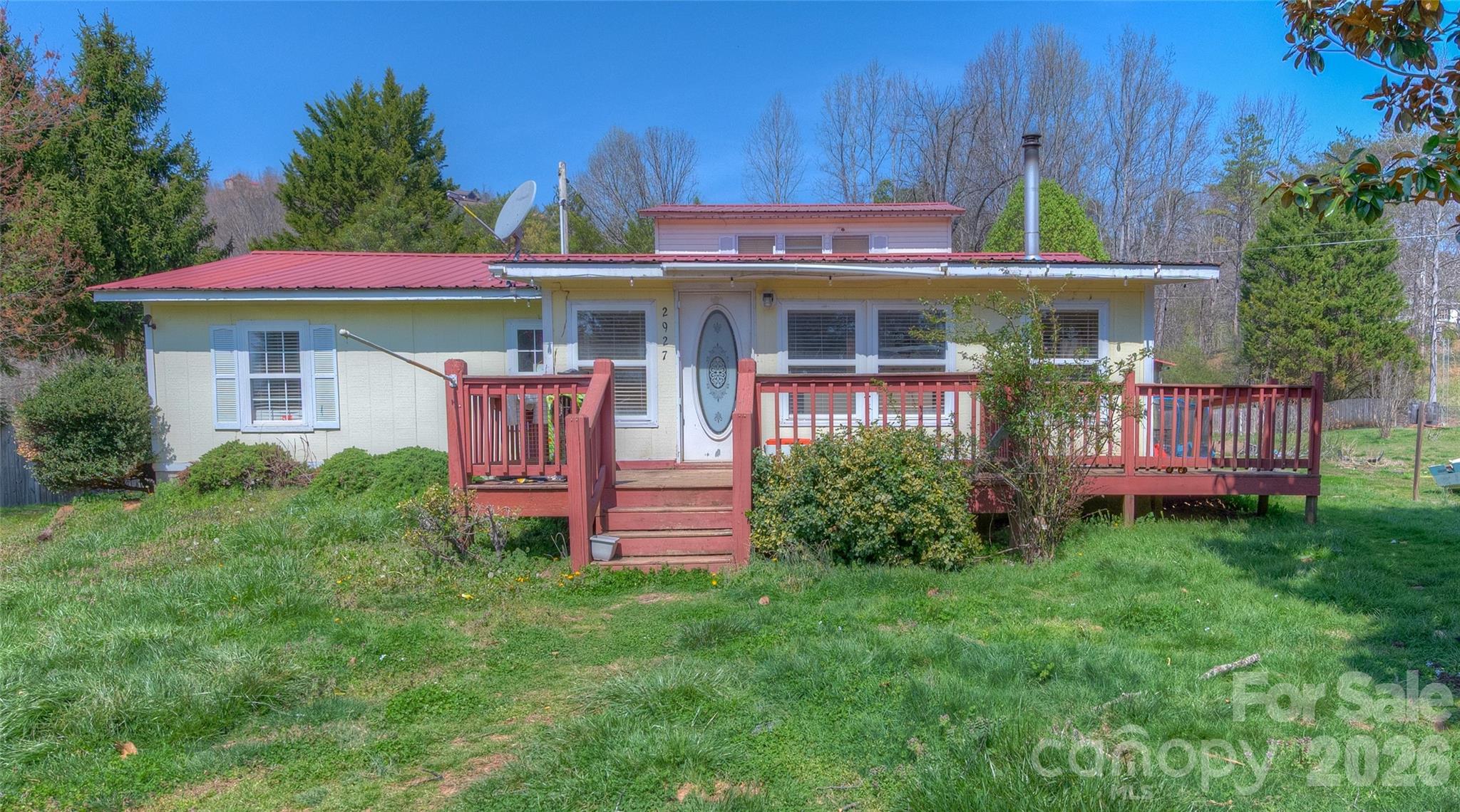 2927 Caney Creek Road Murphy, NC 28906 - Photo 1 of 22 a front view of a house with garden