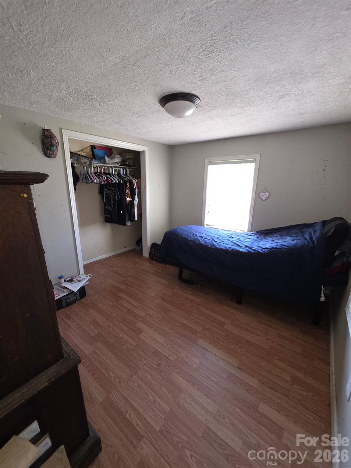 2927 Caney Creek Road Murphy, NC 28906 - Photo 14 of 22 a bedroom with bed and window