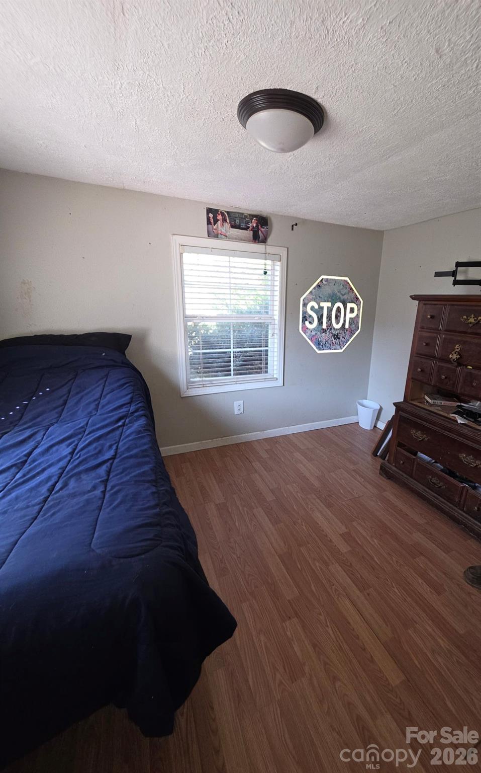 2927 Caney Creek Road Murphy, NC 28906 - Photo 17 of 22 a bedroom with a bed and a window