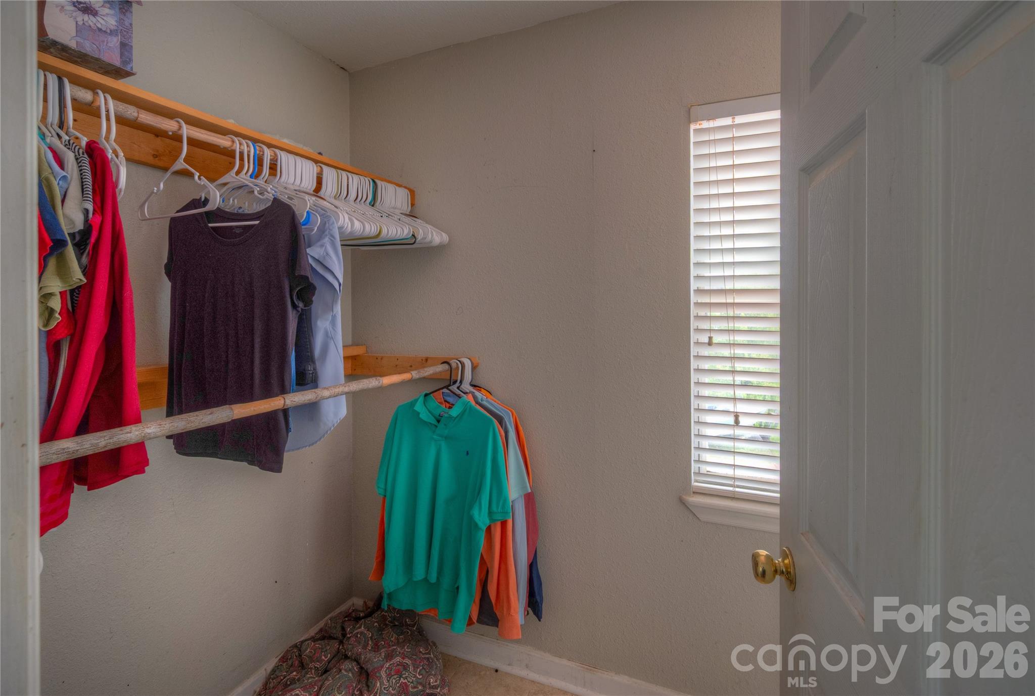 2927 Caney Creek Road Murphy, NC 28906 - Photo 21 of 22 a view of walk in closet with clothes and shoes