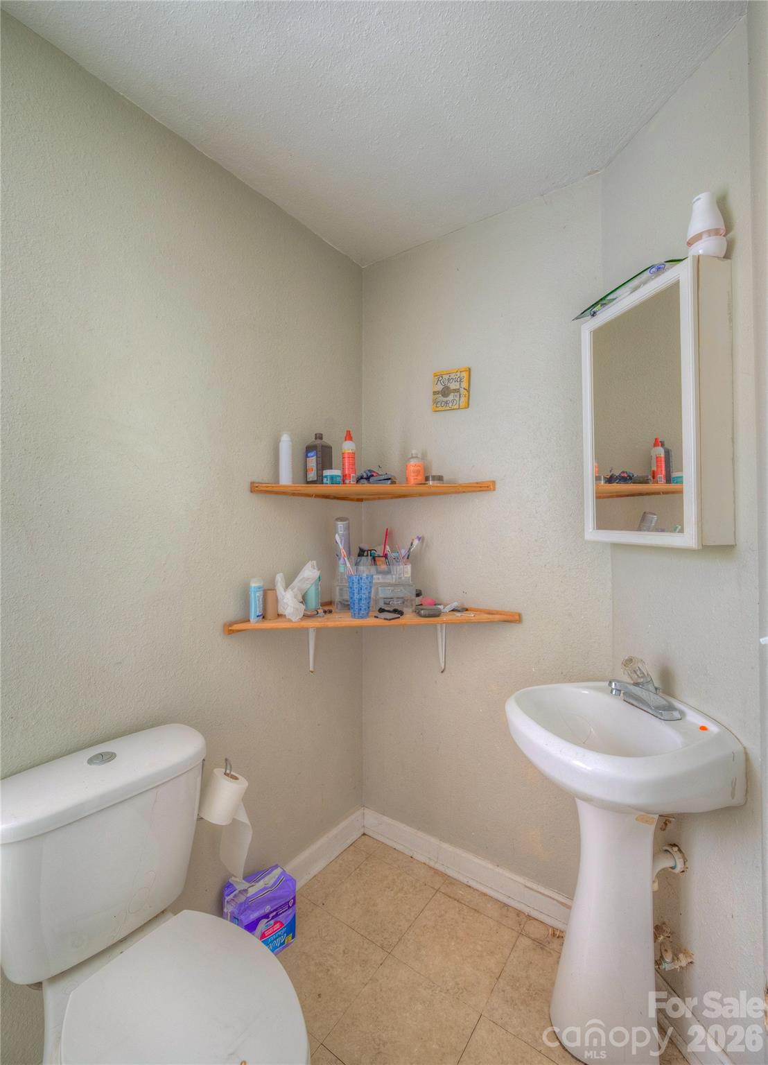 2927 Caney Creek Road Murphy, NC 28906 - Photo 22 of 22 a bathroom with a sink and a toilet