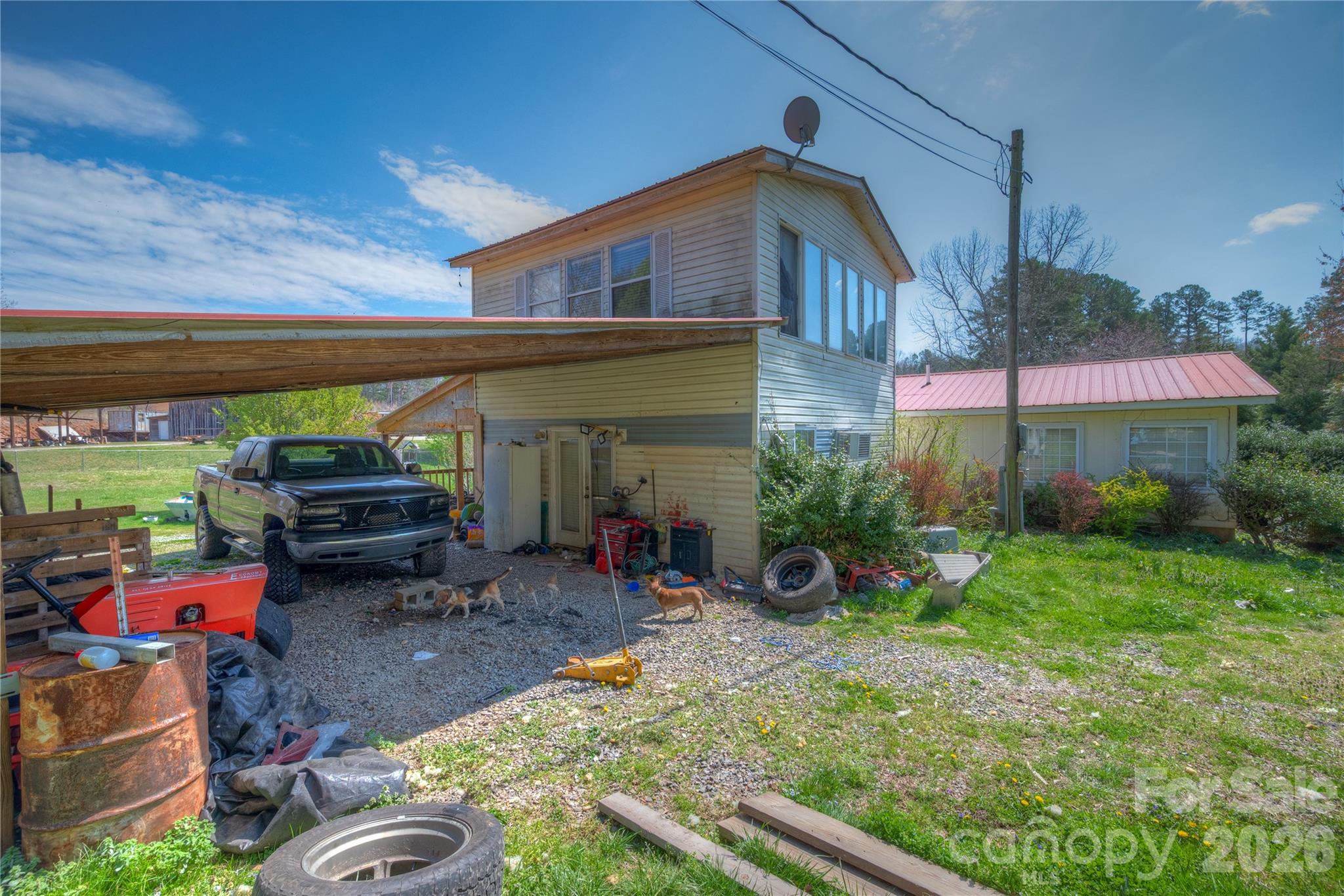 2927 Caney Creek Road Murphy, NC 28906 - Photo 3 of 22 a view of a chair and tables in the patio