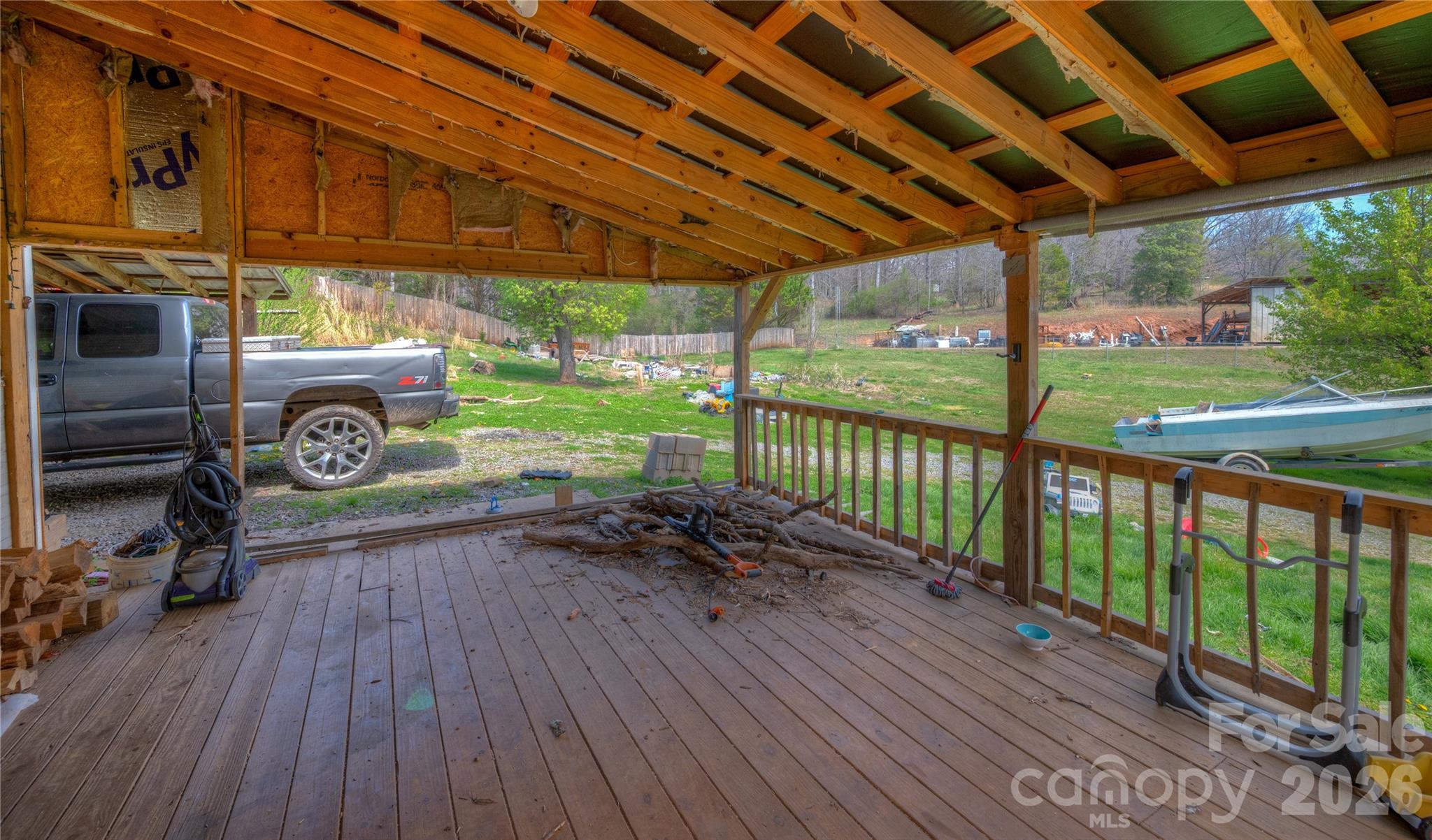 2927 Caney Creek Road Murphy, NC 28906 - Photo 4 of 22 a view of a porch with wooden floor