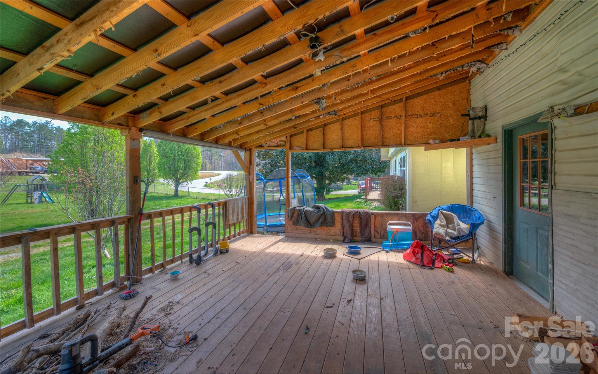 2927 Caney Creek Road Murphy, NC 28906 - Photo 5 of 22 a view of a patio with a table and chairs