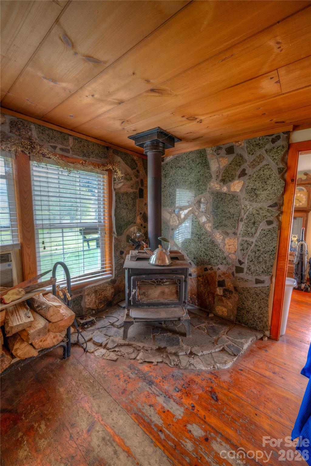 2927 Caney Creek Road Murphy, NC 28906 - Photo 7 of 22 a living room with a couch and a table