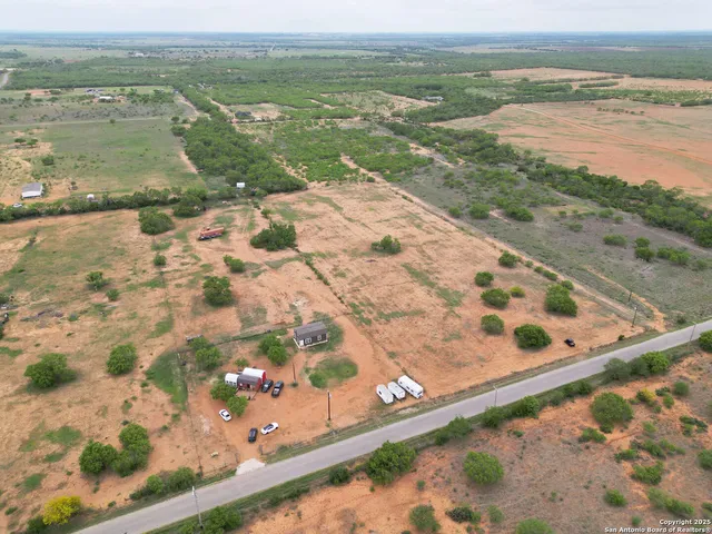 a view of a wooden floor with a bench