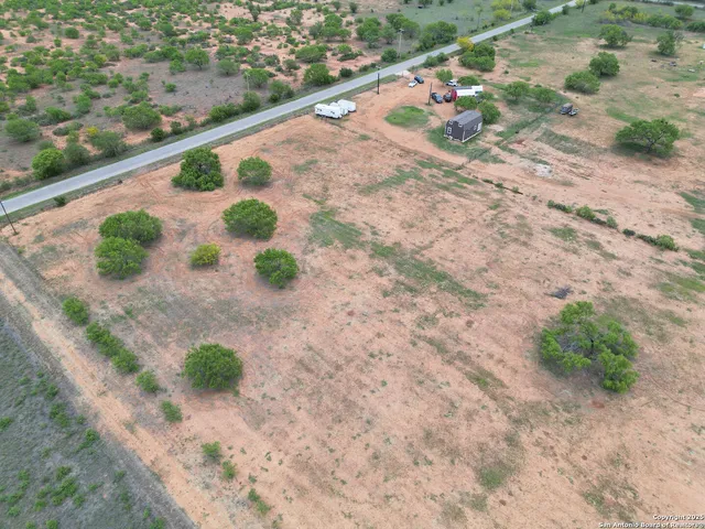 a view of a backyard of a house