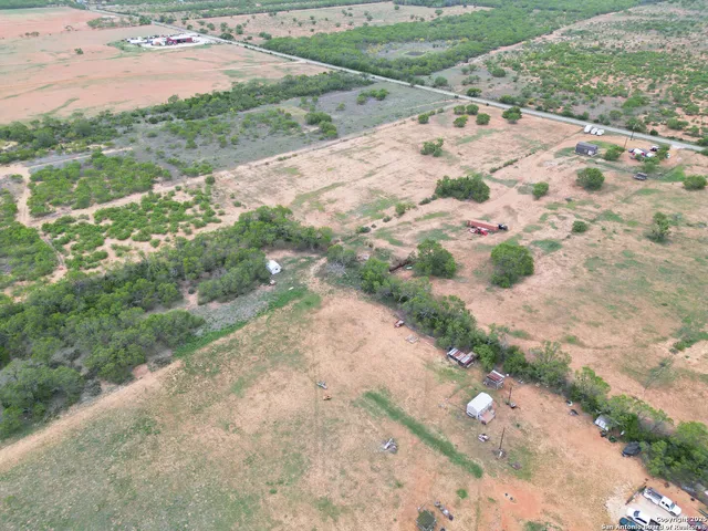 a view of backyard with outdoor space