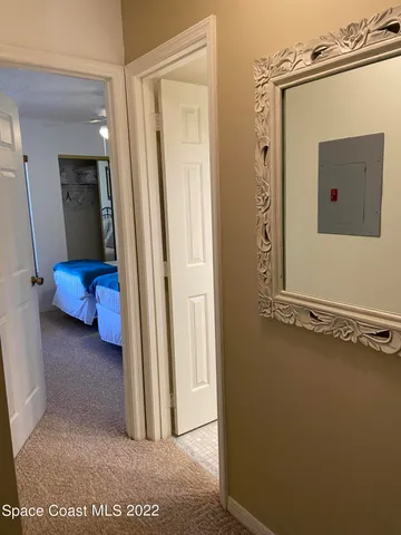 a view of a room with a mirror