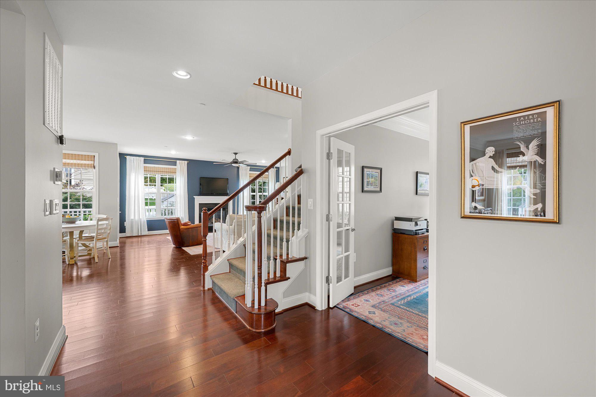 8808 Walnut Hill Road Chevy Chase, MD 20815 - Photo 10 of 60 a view of entryway and hall with wooden floor