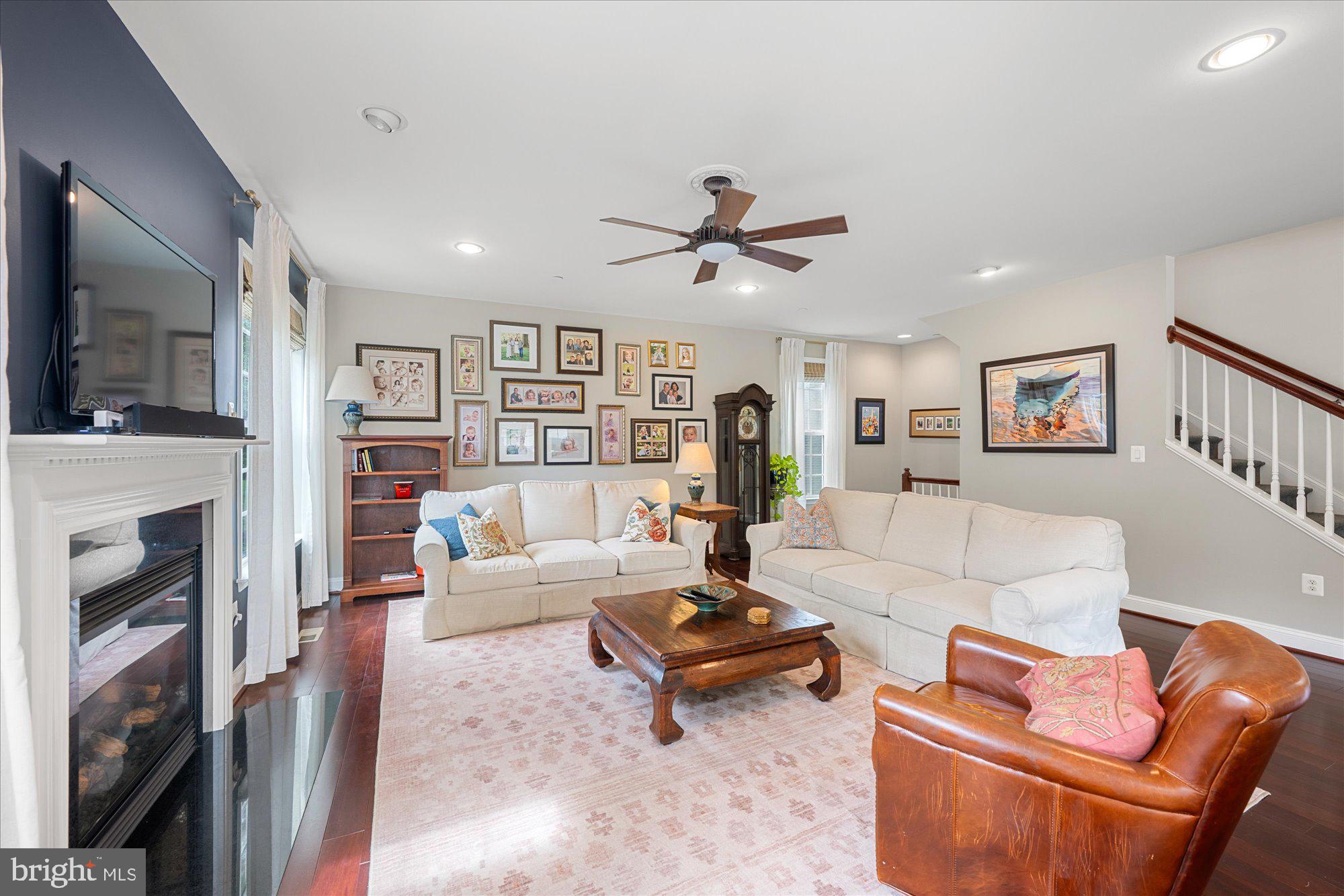 8808 Walnut Hill Road Chevy Chase, MD 20815 - Photo 15 of 60 a living room with furniture and a fireplace