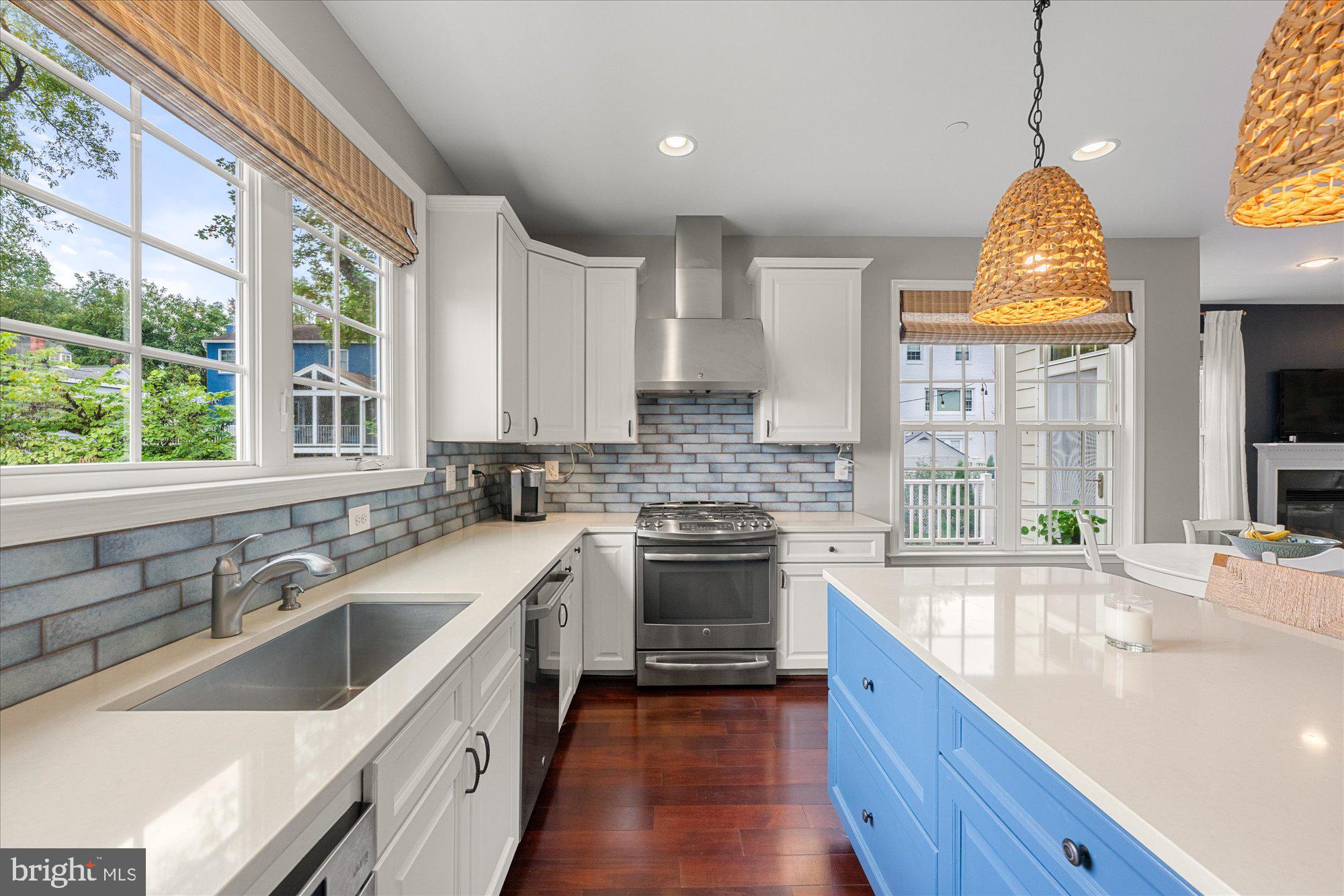 8808 Walnut Hill Road Chevy Chase, MD 20815 - Photo 23 of 60 a kitchen with a sink and a large window