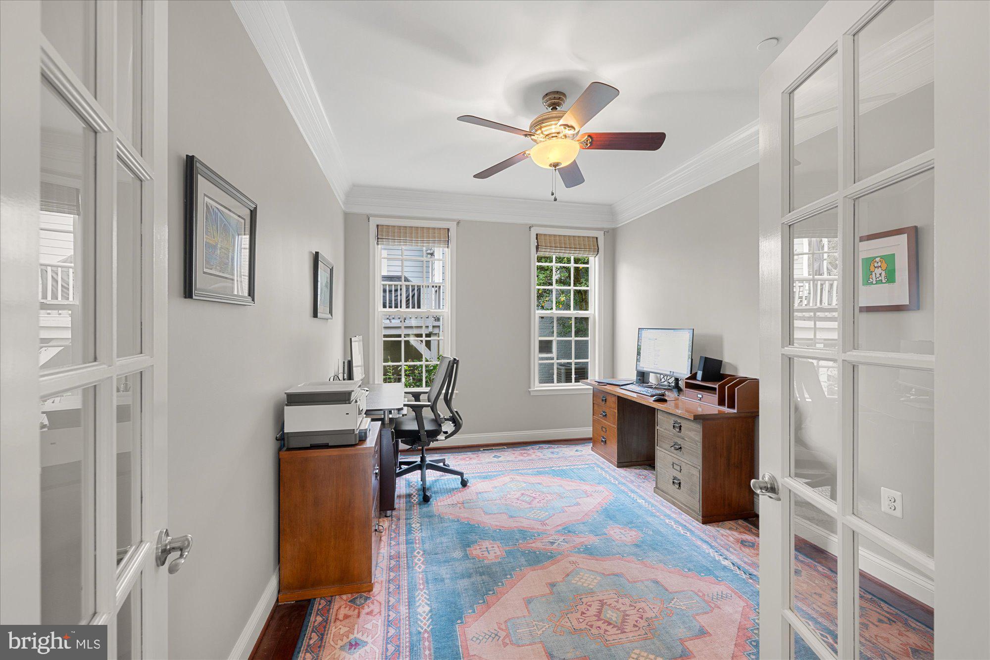 8808 Walnut Hill Road Chevy Chase, MD 20815 - Photo 24 of 60 a view of a livingroom with furniture window and wooden floor