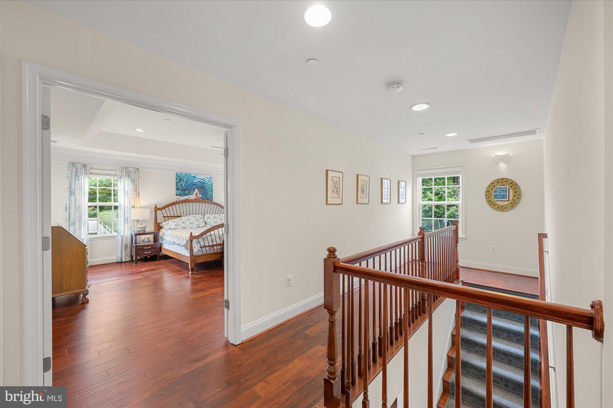 8808 Walnut Hill Road Chevy Chase, MD 20815 - Photo 27 of 60 a view of a livingroom with furniture and hardwood floor