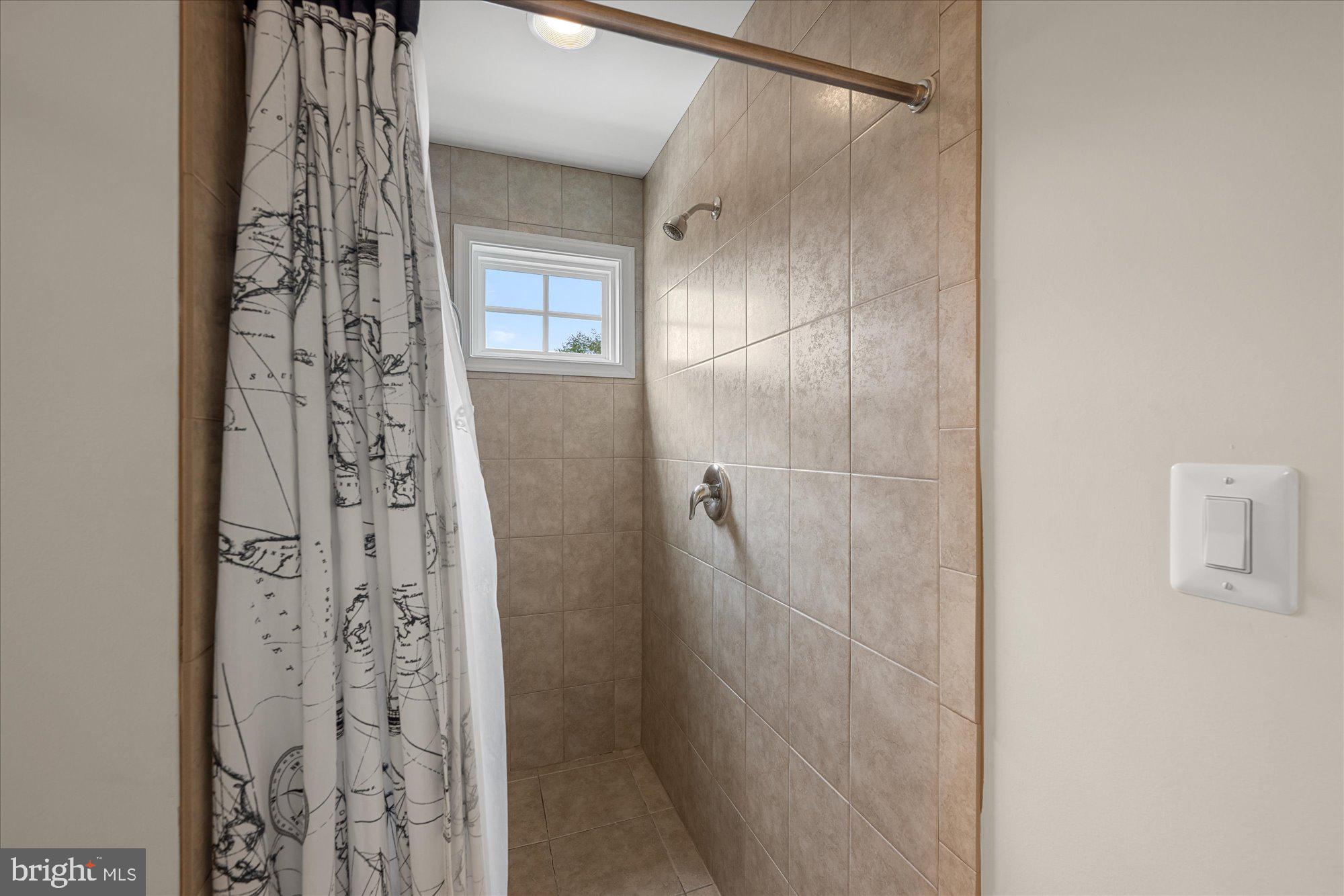 8808 Walnut Hill Road Chevy Chase, MD 20815 - Photo 39 of 60 a bathroom with a shower