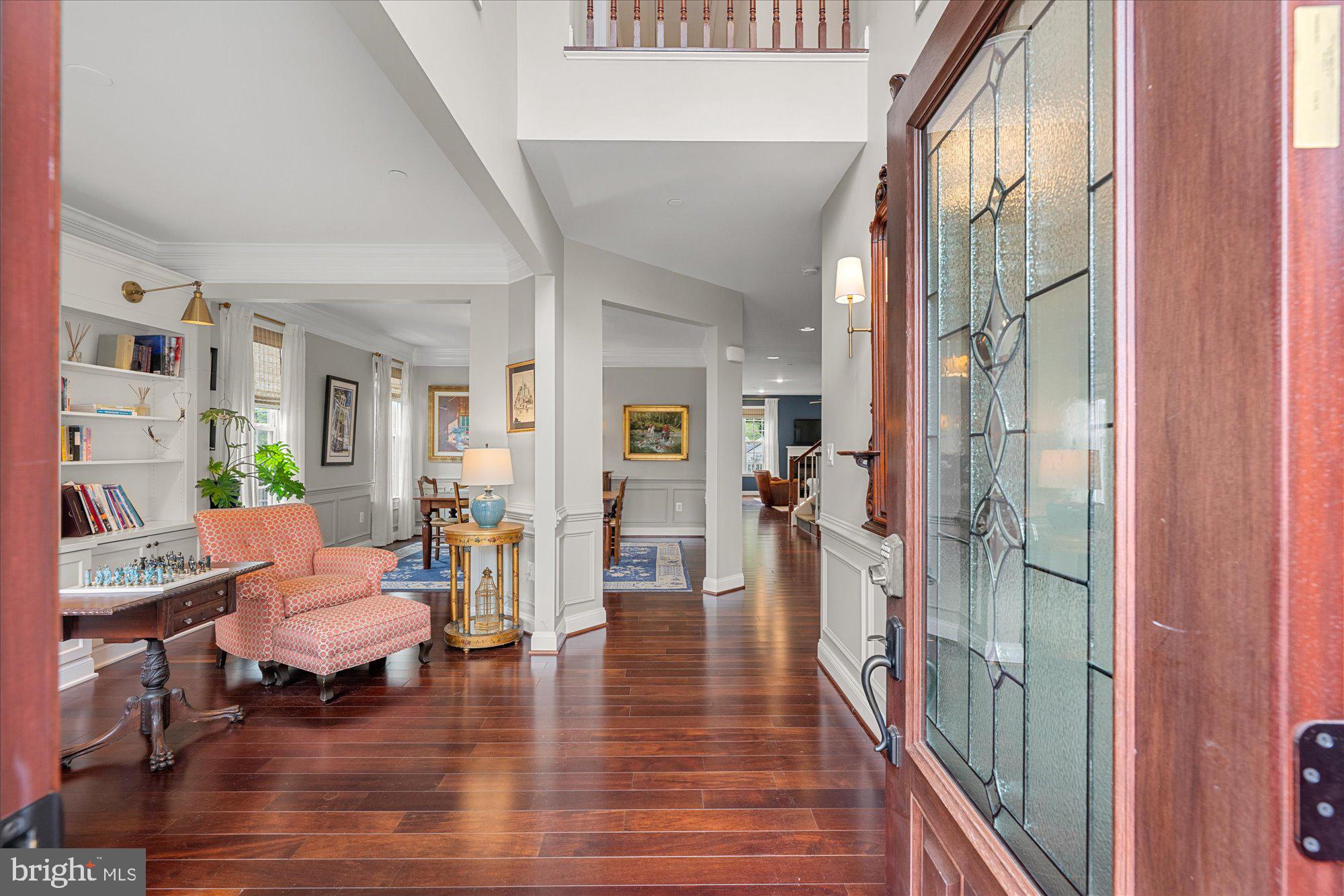 8808 Walnut Hill Road Chevy Chase, MD 20815 - Photo 60 of 60 a living room with furniture and a wooden floor