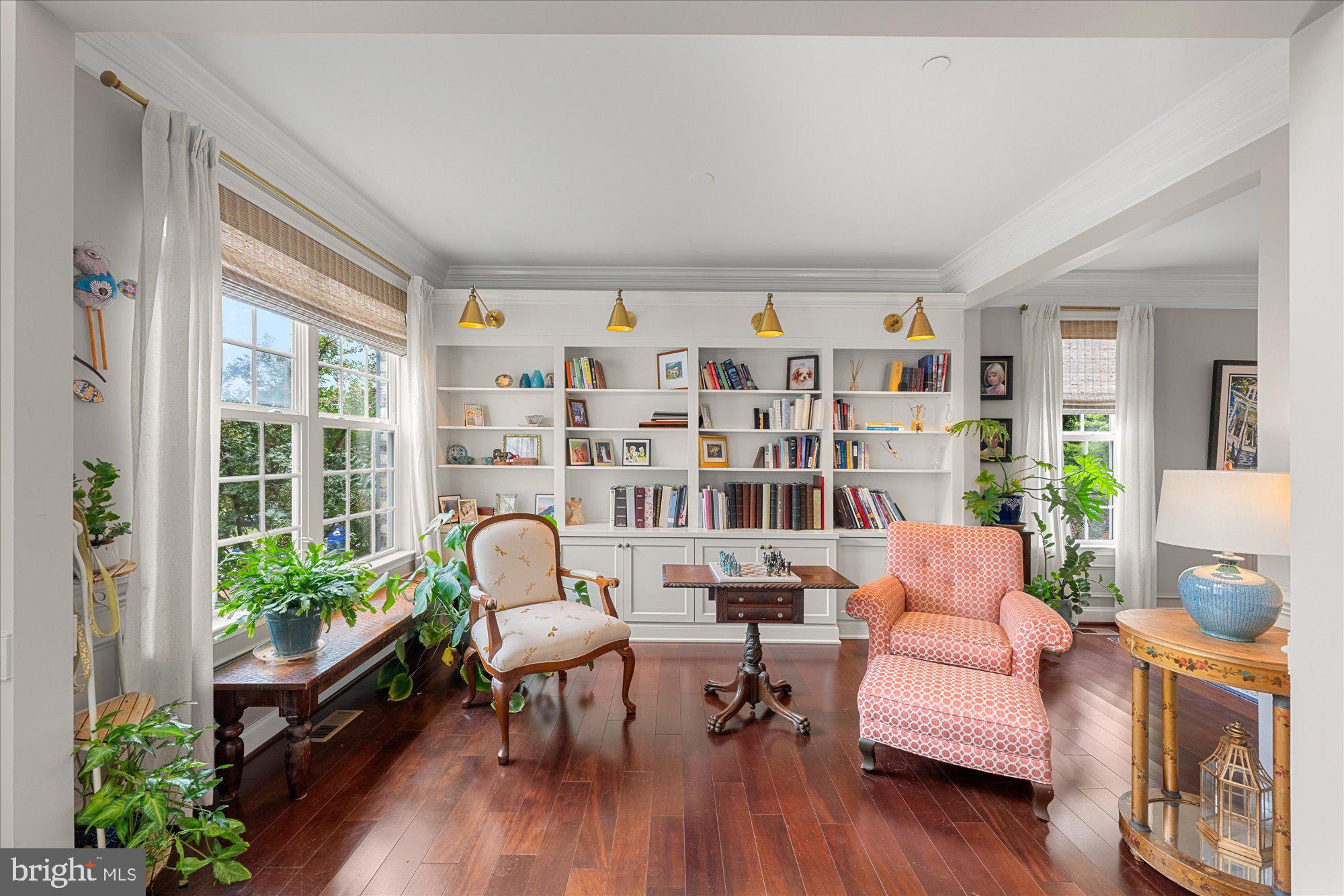 8808 Walnut Hill Road Chevy Chase, MD 20815 - Photo 4 of 60 a living room with furniture and a potted plant