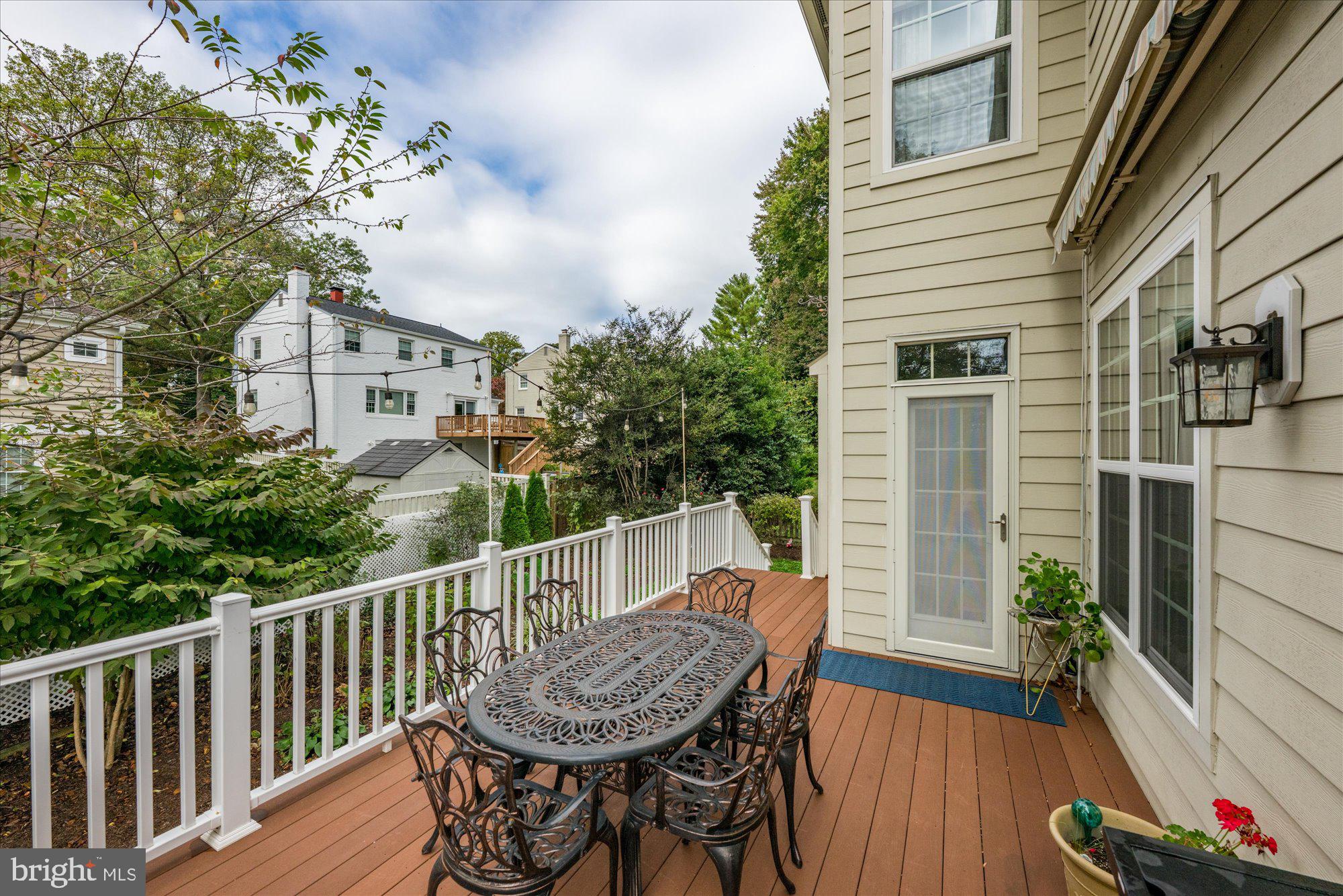 8808 Walnut Hill Road Chevy Chase, MD 20815 - Photo 52 of 60 a view of a chair and table in the balcony