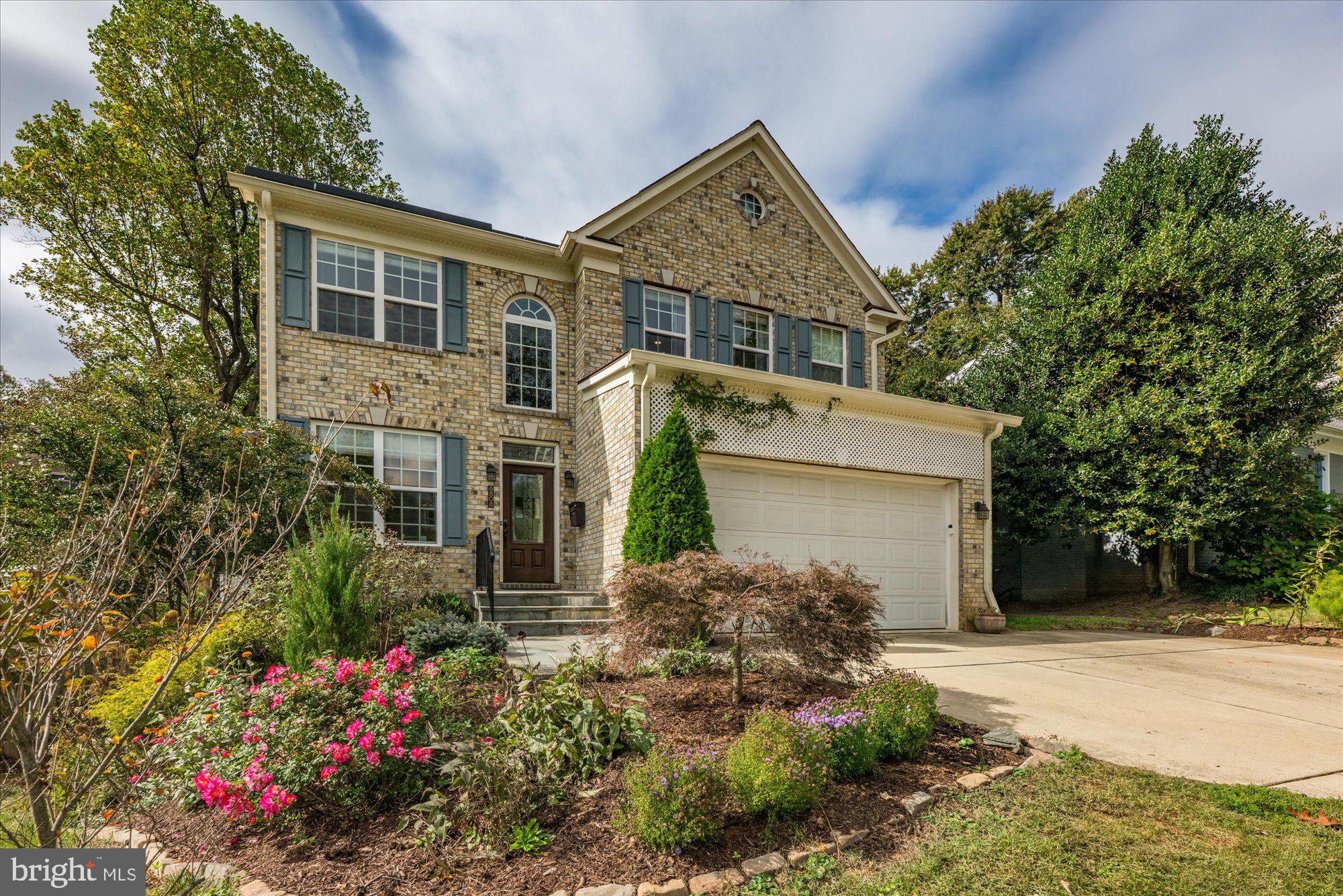 8808 Walnut Hill Road Chevy Chase, MD 20815 - Photo 58 of 60 front view of a house with a yard
