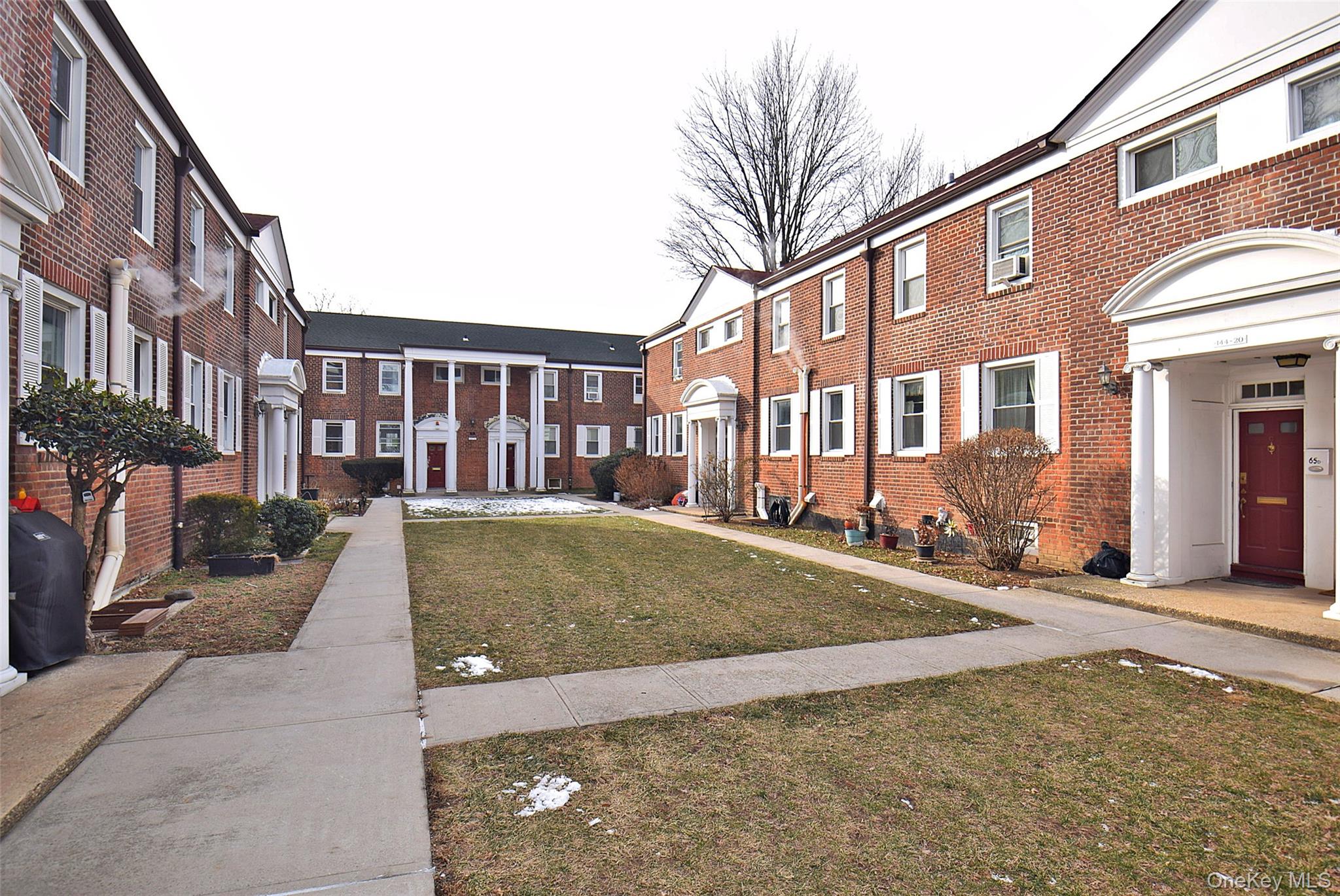a view of a building with a street