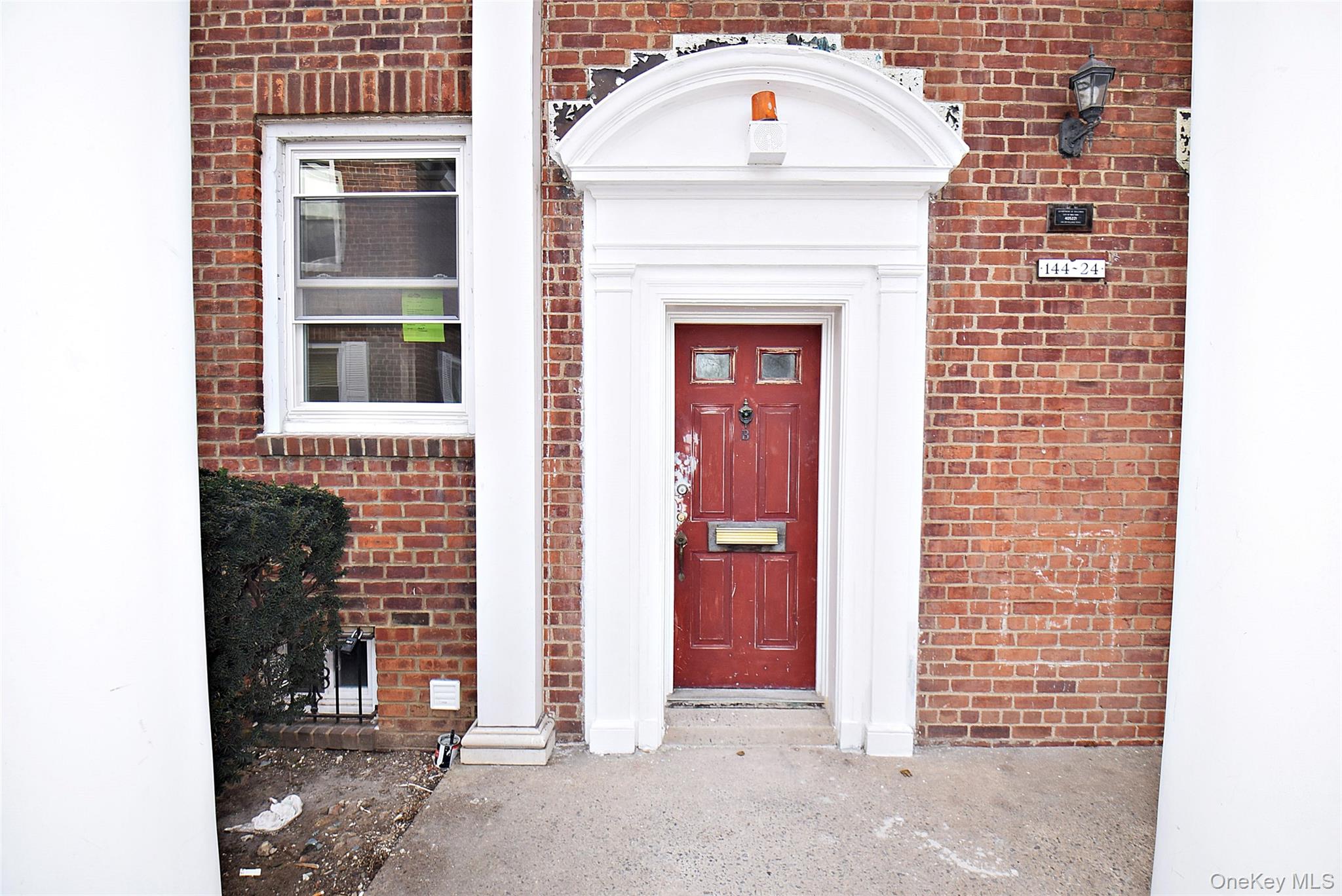 144-24 Village Road, Unit 67B Queens, NY 11435 - Photo 2 of 17 a view of building with front door
