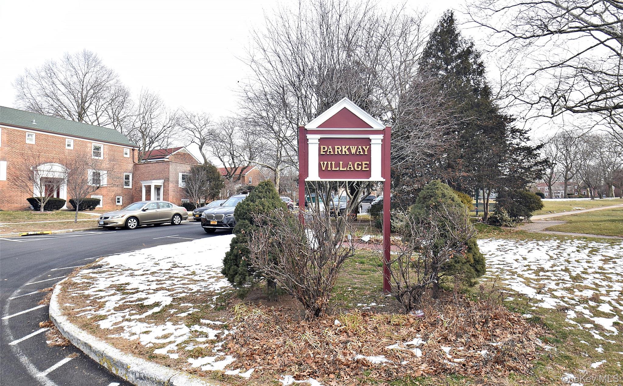 144-24 Village Road, Unit 67B Queens, NY 11435 - Photo 5 of 17 a sign board with parking space