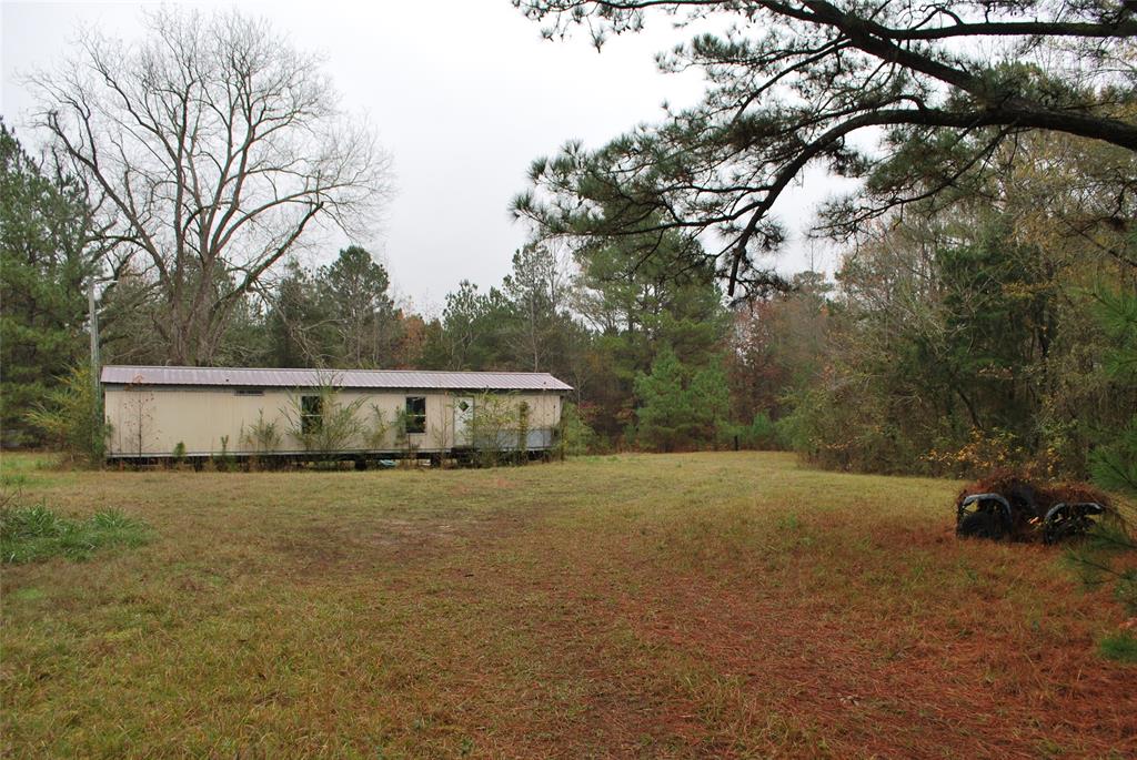 a view of patio and yard