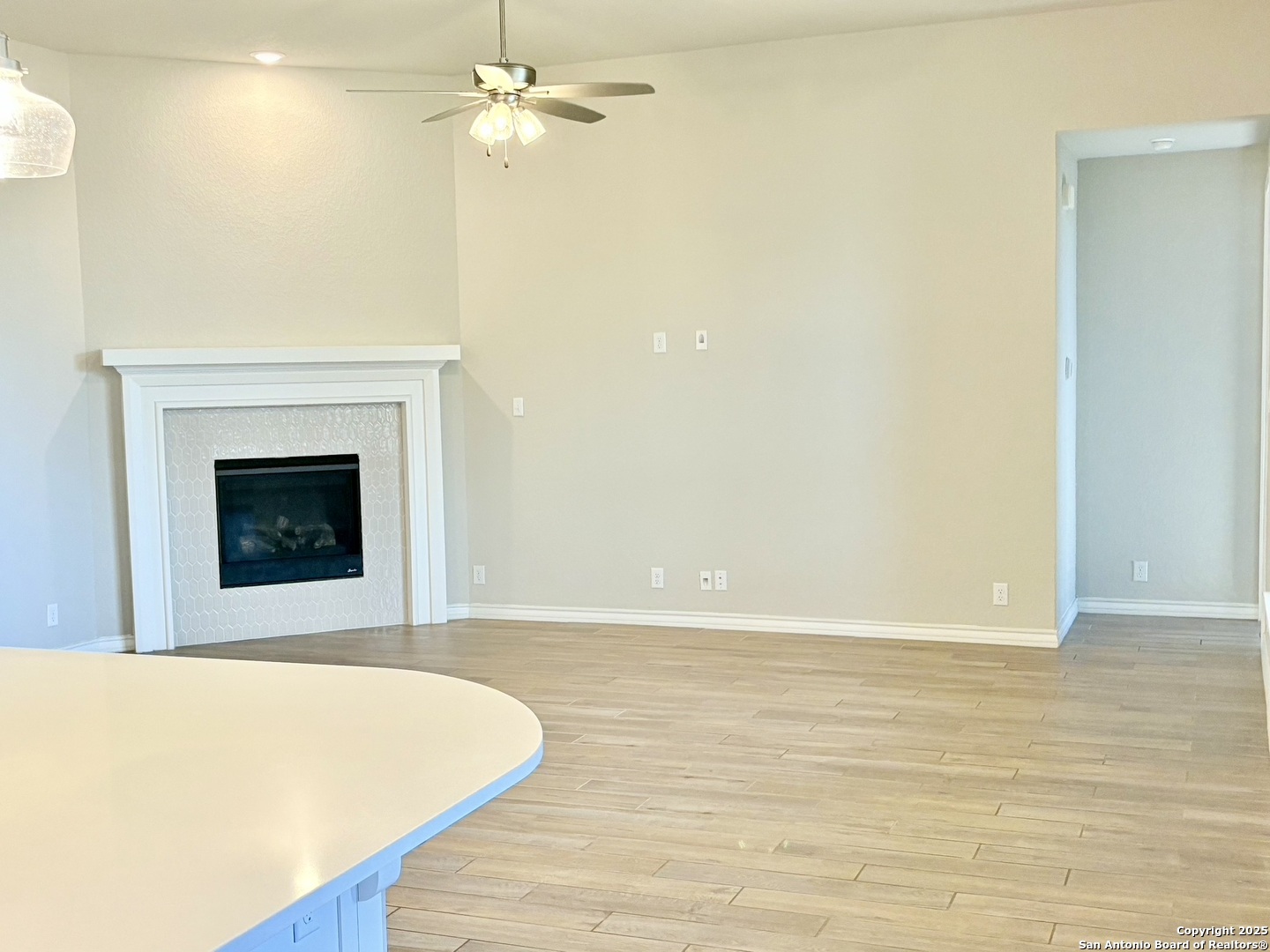 1567 Terrys Gate Road New Braunfels, TX 78132 - Photo 11 of 30 a view of an empty room with a fireplace