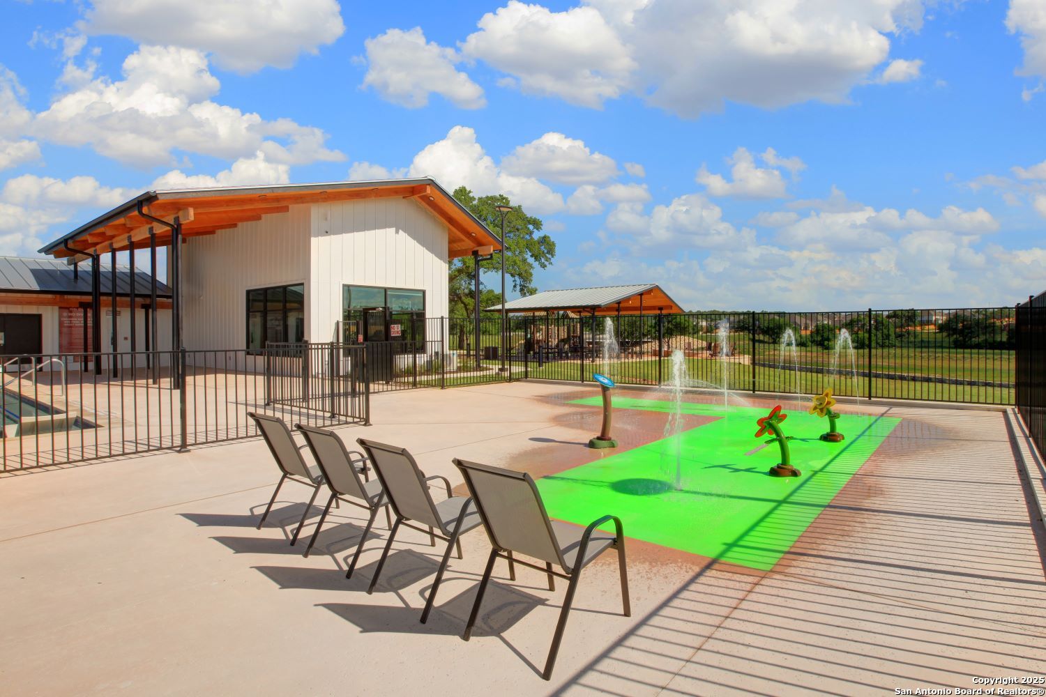 1567 Terrys Gate Road New Braunfels, TX 78132 - Photo 26 of 30 a view of swimming pool with outdoor seating and city view