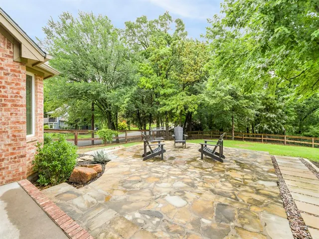 a view of a park with swings and slides
