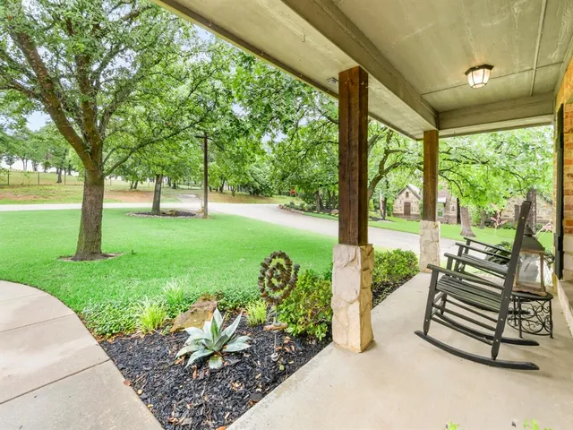 a garden view with a seating space