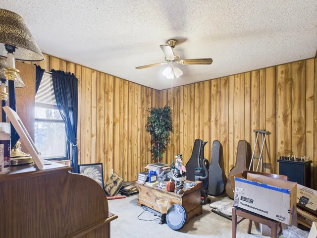 a bedroom with furniture and a bed