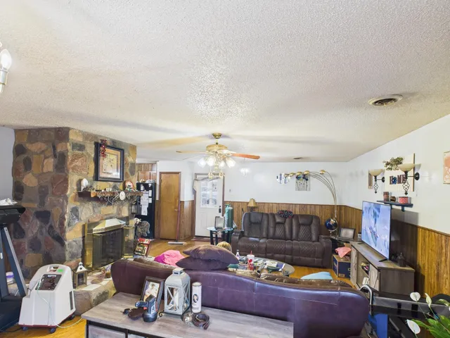 a view of a room with lots of furniture and lots of furniture