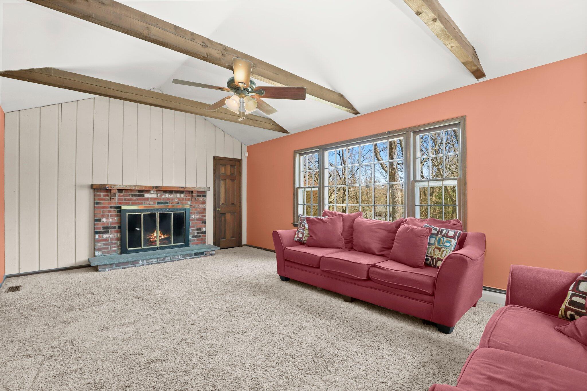 7 Allen Way Bethel, CT 06801 - Photo 17 of 31 a living room with furniture and a fireplace