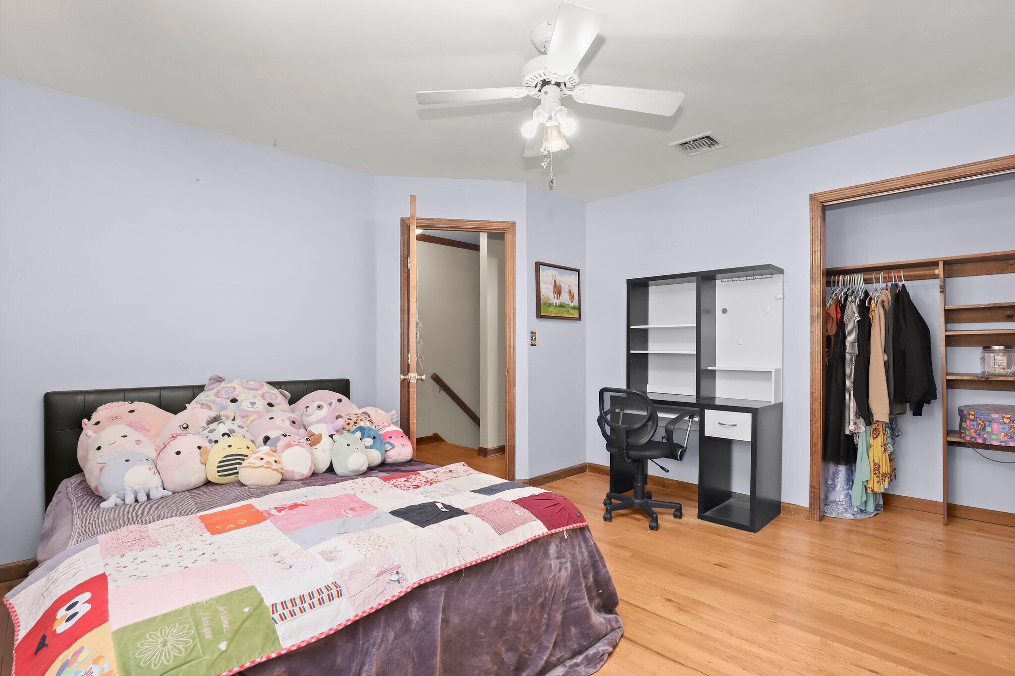 7 Allen Way Bethel, CT 06801 - Photo 24 of 31 a bedroom with bed and wooden floor